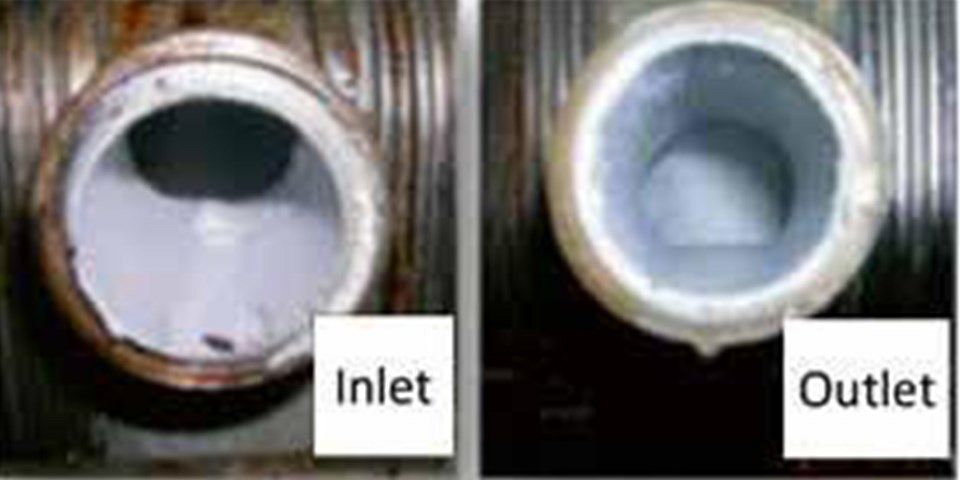 Fig. 1. Milk fouling on the inlet and outlet of a heat exchanger after an eight-hour run. Source: http://antifoulinghe.com/marketplace/