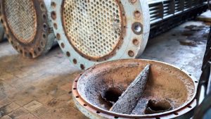 Corrosion-resistant heat exchanger chiller tubes with flanges, for a refinery.