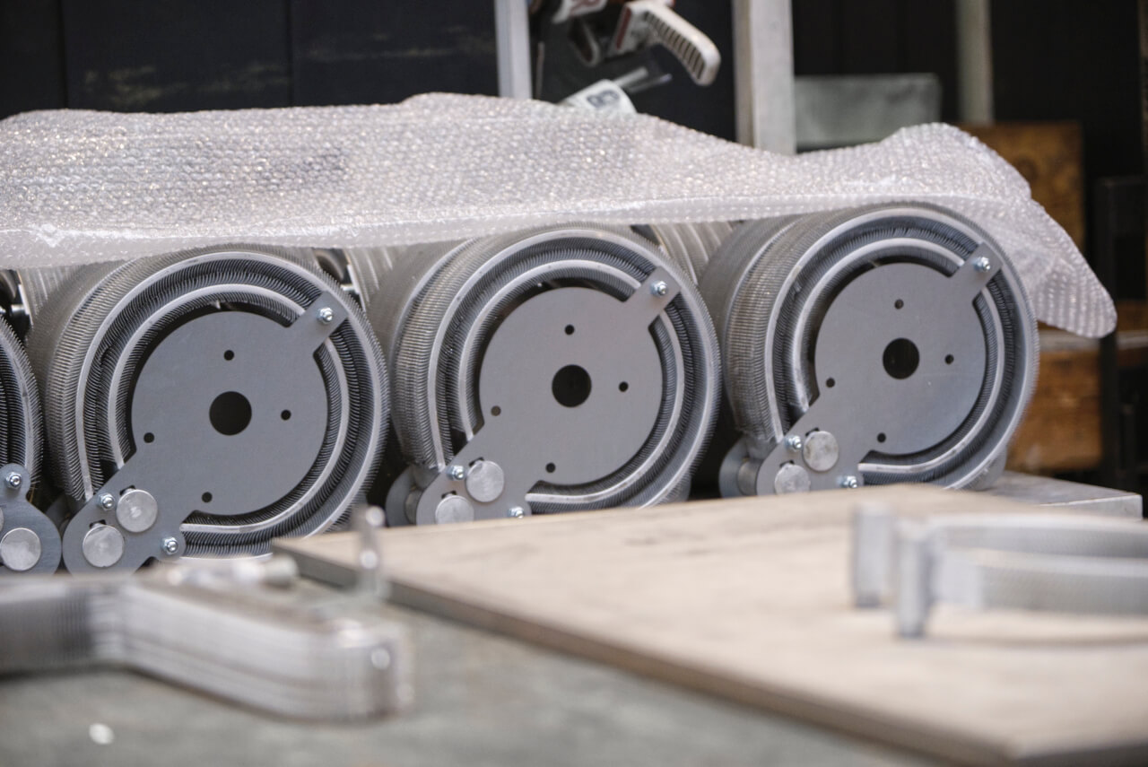 A set of finished, custom skived fin heat exchangers ready for delivery. Image courtesy of SAG.