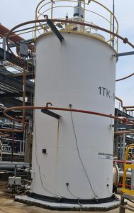 A flat-bottom storage tank is inspected using Acoustic Emission Testing.